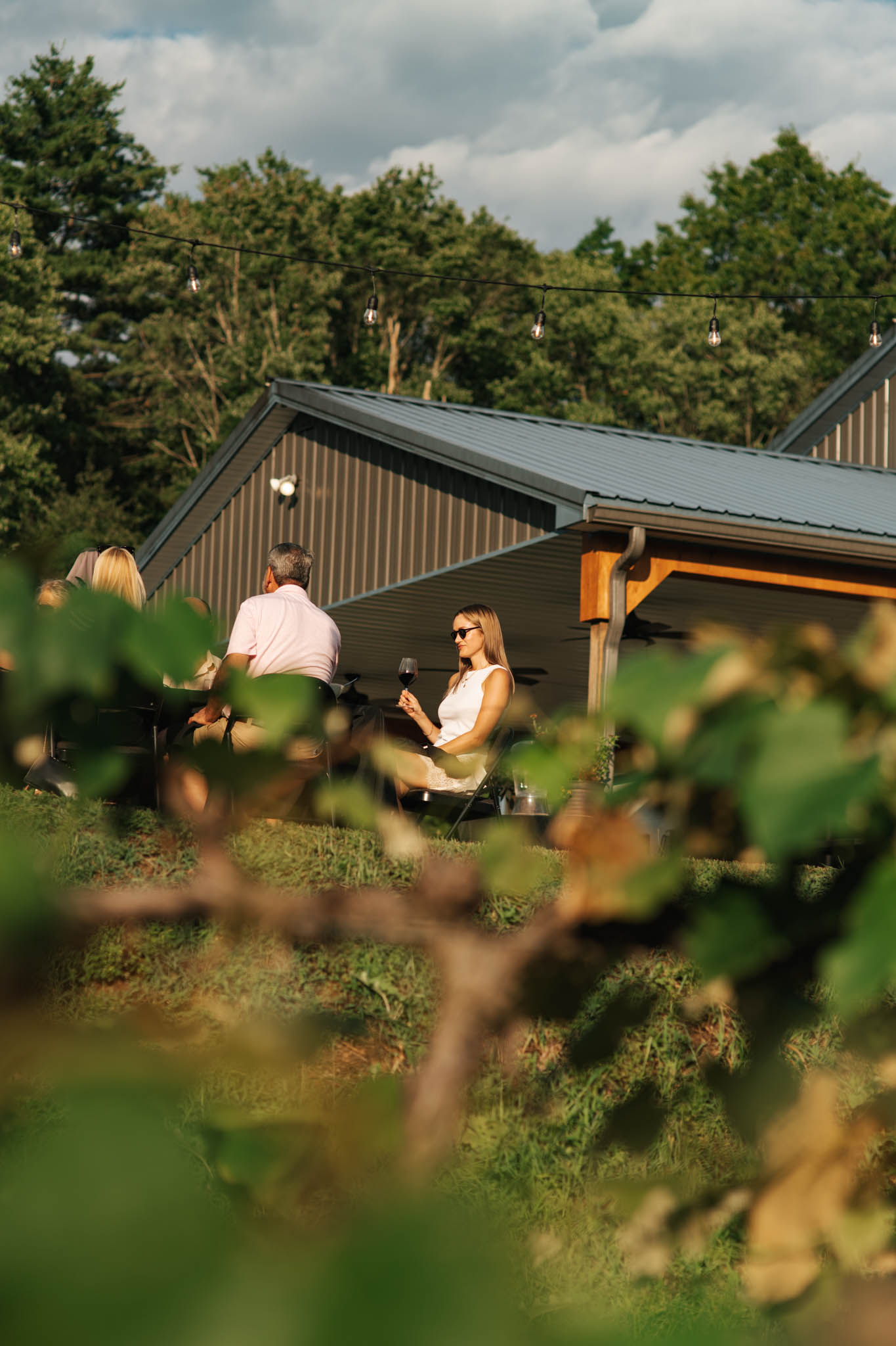 Guests enjoying a tasting outside the Cellar Beast Winehouse, Andreas PA